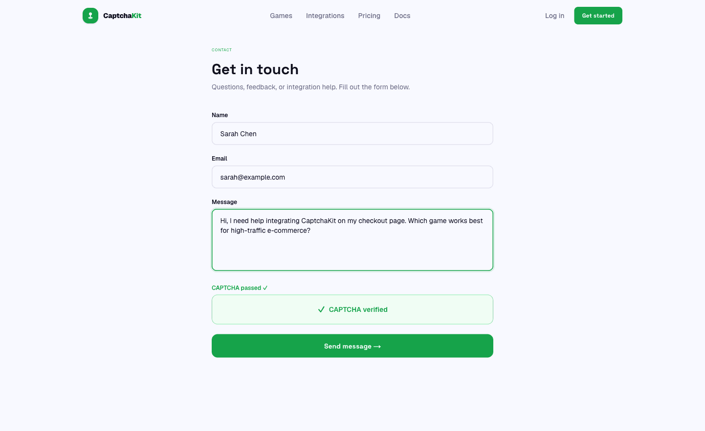 The same contact form after the visitor clears the game, showing the green CAPTCHA verified confirmation above the send message button.
