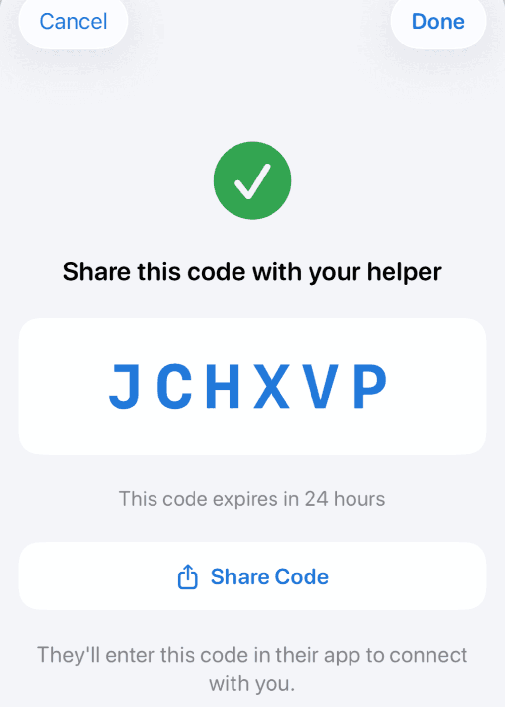 PillPair's pairing screen showing a one-time six-letter code and a Share Code button, used to connect a family member's phone